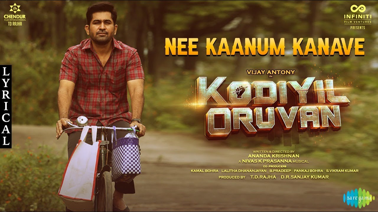 Nee Kaanum Kanave Lyric Video | Kodiyil Oruvan
